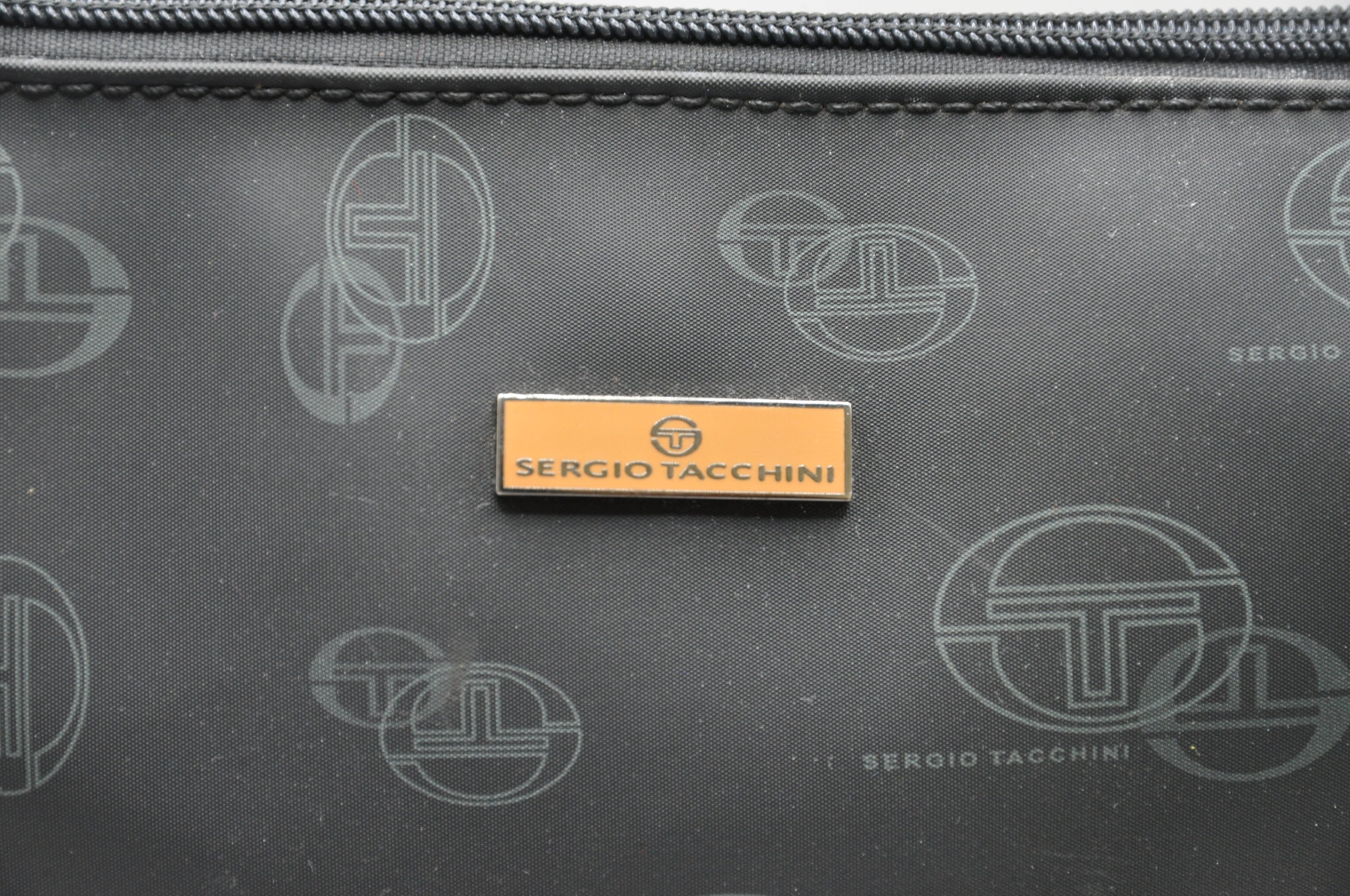 Sergio tacchini bag in Schwarz-Braun.